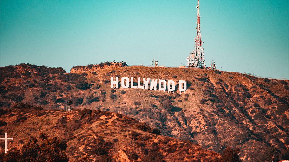 drone aerial view of the hollywood sign at sunset in Los Angeles, California, USA